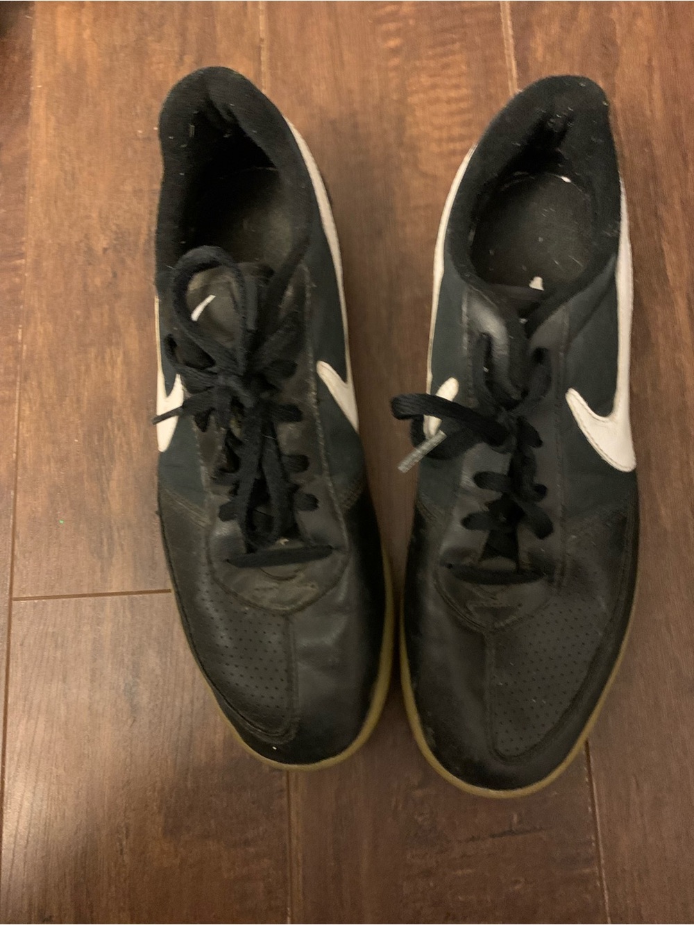 Men's Black soccer cleats with White Swoosh